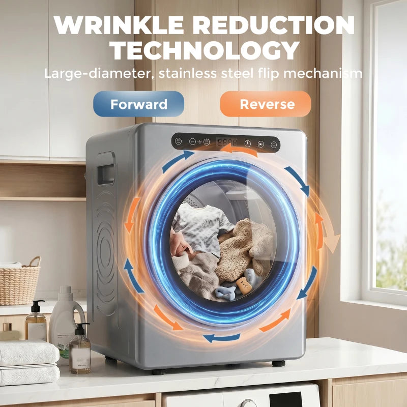Silver tumble dryer with glowing circular drum and mixed laundry inside