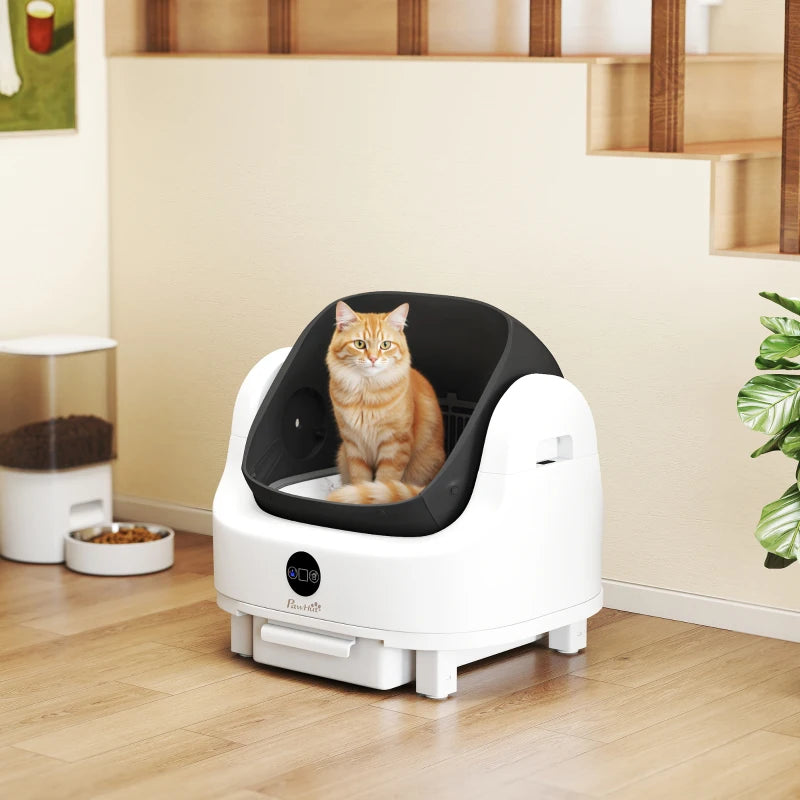 White automatic cat litter box with black insert, PawHut logo, and sitting orange cat.