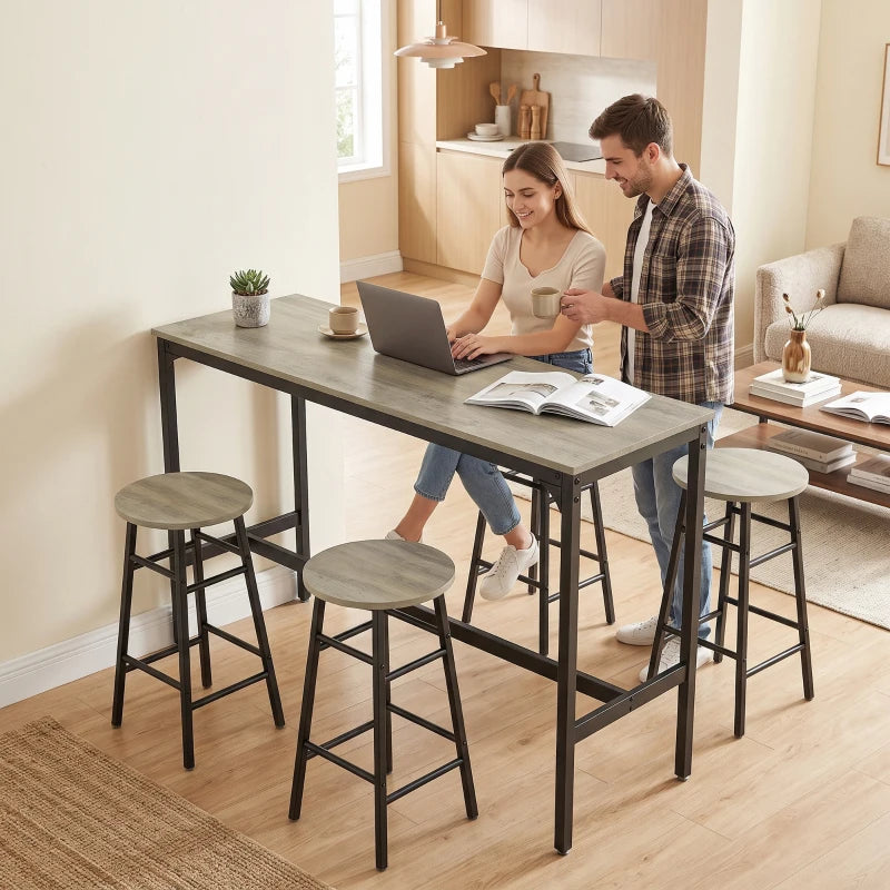 Grey bar table set with two stools in front and two at the sides, black metal frames
