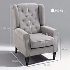 Light grey wingback armchair with button-tufted back and padded seat