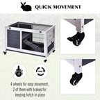 Grey and white rabbit hutch on four caster wheels with wire side panels