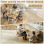 Round dining table showing one leaf folded for smaller seating