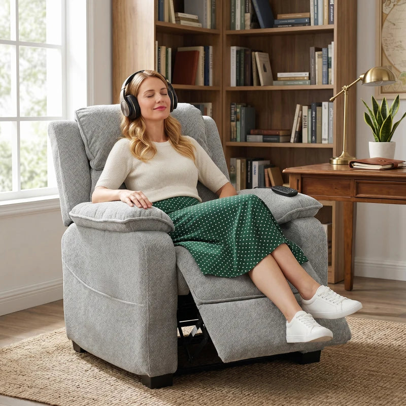 Light grey power recliner armchair with raised leg rest and reclined backrest