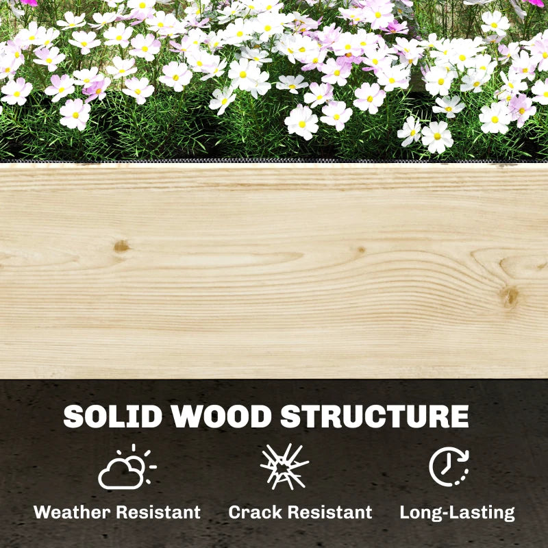 Wood raised planter wall with white flowers along the top edge