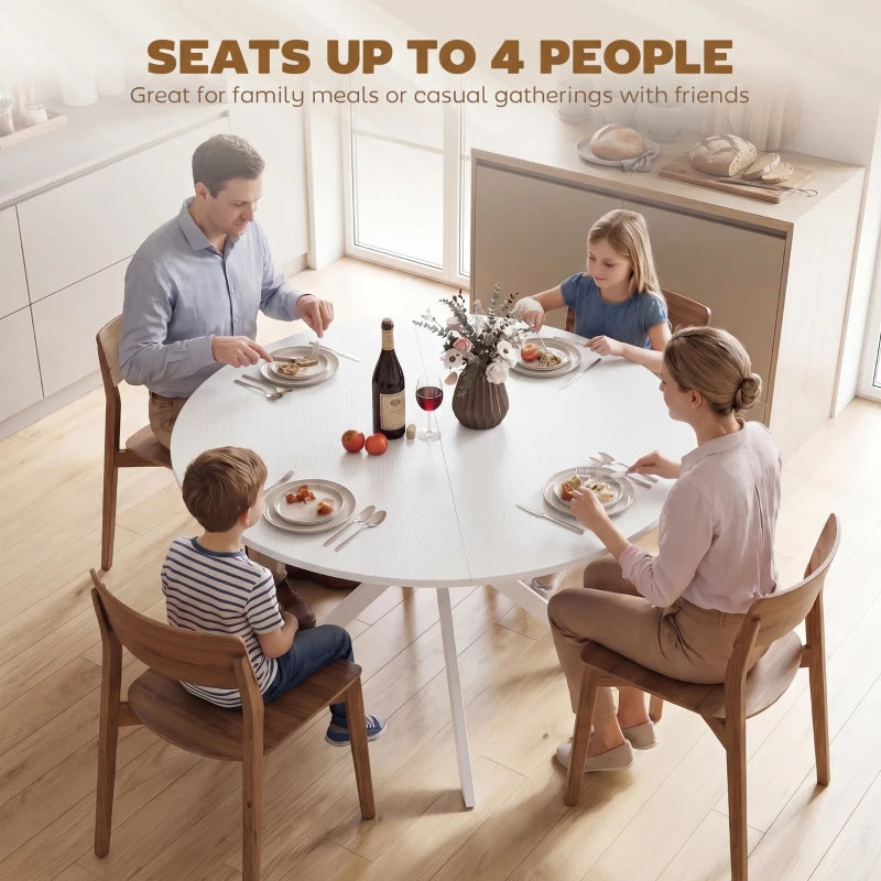 White round dining table with four seats and metal cross legs