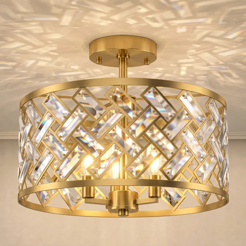 Gold-tone crystal ceiling light close-up with circular metal ring and faceted prisms