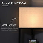 Black corner floor lamp with beige fabric shade and stacked storage shelves