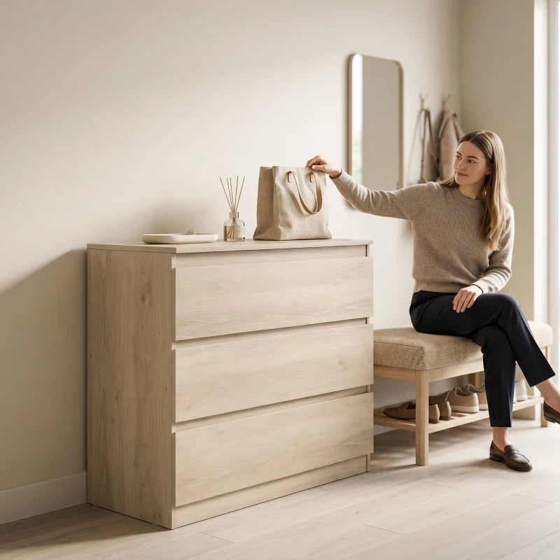 Oak 3-drawer chest of drawers with a person opening the top drawer.