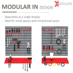 Modular gray pegboard organizer with red hooks and hooks for hanging tools and accessories
