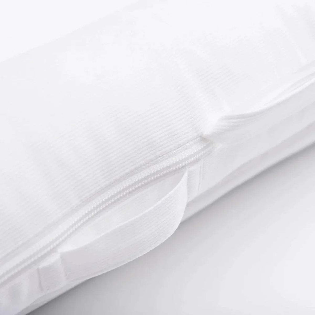 White baby dock cover seam detail with zipper track and fastening tab