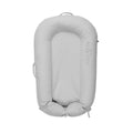 Light gray padded baby lounger dock with raised sides and inner bolster
