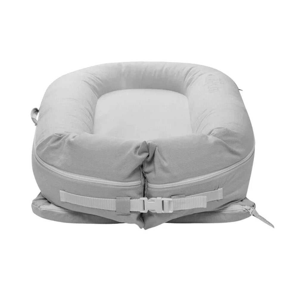Light gray baby lounger dock with cinch straps and gathered base
