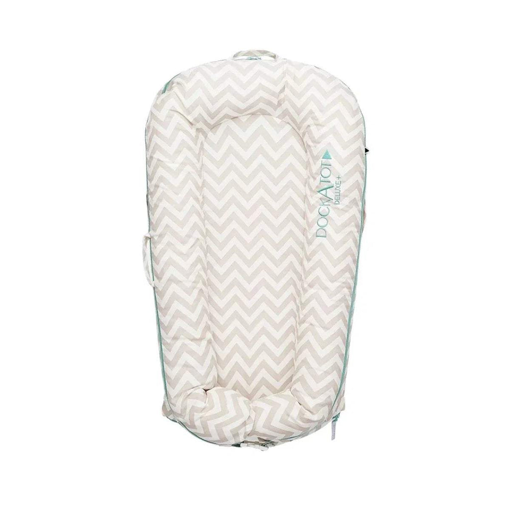 Baby lounger dock cover with light chevron pattern, teal zipper trim