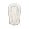 Baby lounger dock cover with light chevron pattern, teal zipper trim