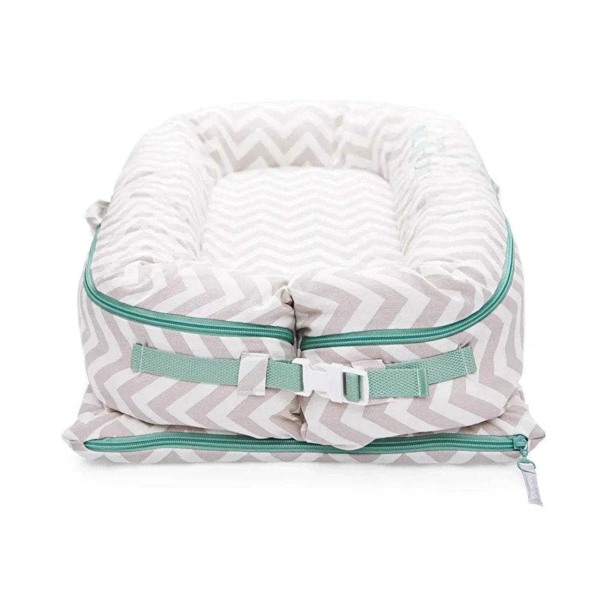 Baby lounger with light chevron fabric, teal zipper edge and side straps