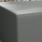 Close-up dark grey patio furniture cover corner seam and smooth fabric surface