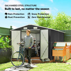 Dark grey garden storage shed with roof vents and open double doors
