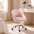 Pink velvet office chair with curved back, padded seat, and chrome caster base