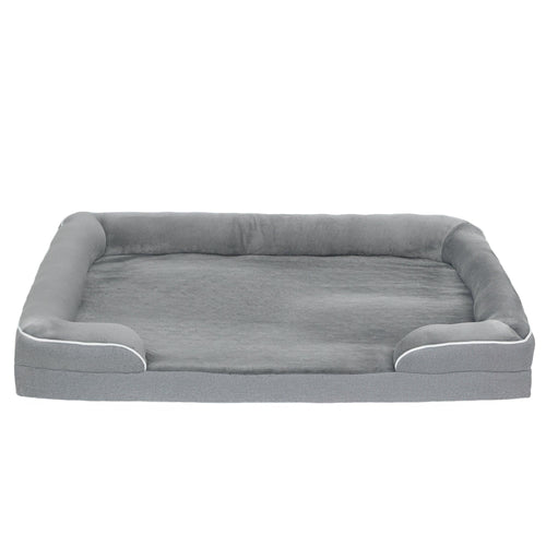 Grey fabric dog sofa bed with cushioned bolsters and raised sleeping platform