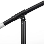 Black cantilever umbrella pole joint clamp and adjustment hardware detail