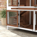 Two-tier wooden pet hutch side view with open door and interior wooden shelves
