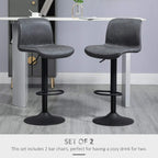 Set of 2 dark grey bar stools with backrest, footrest ring, and black pedestal bases