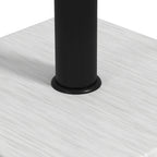 Close-up of black pole base set into white wood-effect rectangular slab