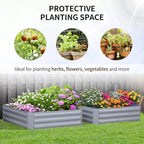 Grey raised garden bed set of 2 with dense flower and herb planting in yard