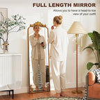 Full length mirror with ornate baroque gold frame, showing a person using it