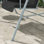 Bottom view of 2-seater patio swing bench legs and frame on stone pavers