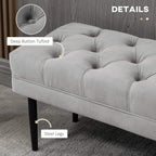 Grey velvet bed end bench detail, deep button tufting and steel legs