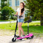 Pink foldable electric kids scooter being ridden outdoors, showing seat and kickstand