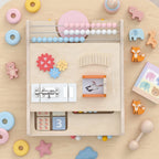Wooden activity panel insert with bead tracks, gears, abacus, and blocks