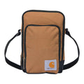 Tan crossbody zip bag with front zipper pocket, black trim, and Carhartt label