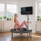 Black trampoline with stable frame and padded jumping surface for low-impact workouts