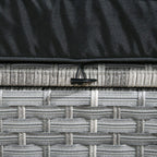 Grey rattan wicker weave detail with black cushion edge on a corner sofa arm