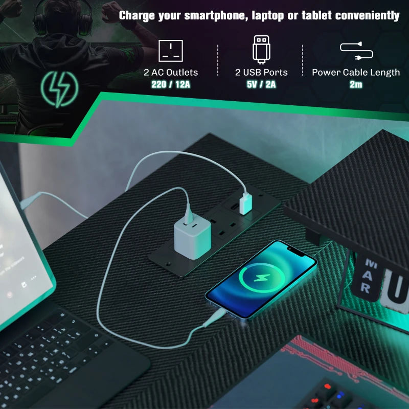 Black gaming desk with built-in power outlets and USB ports on top