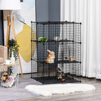 Black metal pet playpen enclosure with ramped platforms and a small-animal layout
