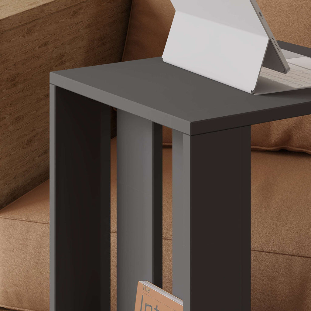 Dark gray modern side table with open shelf and smooth tabletop, on rolling casters