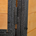 Black speckled metal latch and door frame on the wooden guinea pig hutch panel