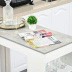 Grey tabletop with magazines and decor items on a white bar table