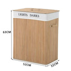 Natural wood laundry hamper with white fabric lid labeled “LIGHTS” and “DARKS”
