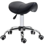 Black faux leather saddle cosmetic stool with rounded seat and swivel base
