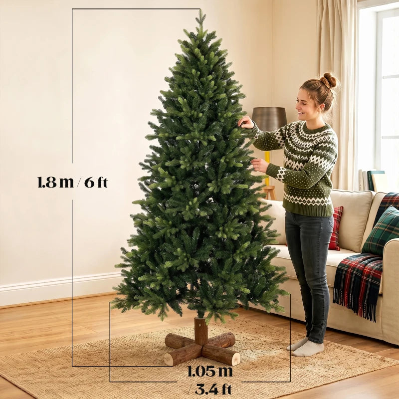 Green artificial Christmas tree, full height with hinged branches and wooden base
