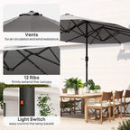 Dark grey patio umbrella showing ribbed frame, vent design, and solar LED switch control