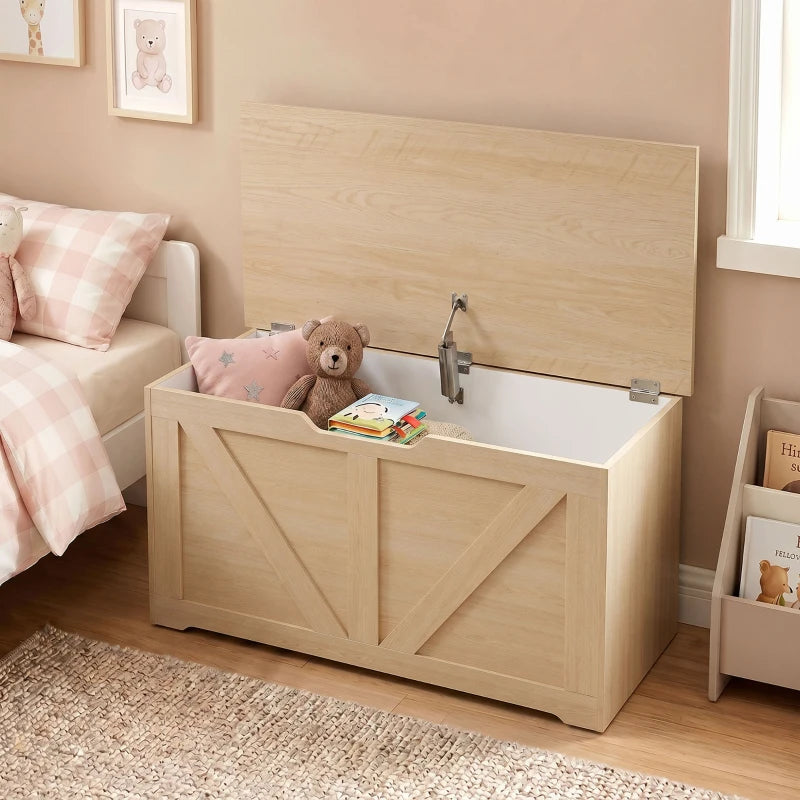 Wooden storage chest with open lid holding a teddy bear and books