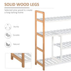 Four-tier shoe rack with sturdy natural wood legs and white slatted shelves