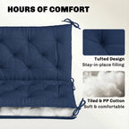Dark blue bench cushion with tufted back, filled padding, and securing ties