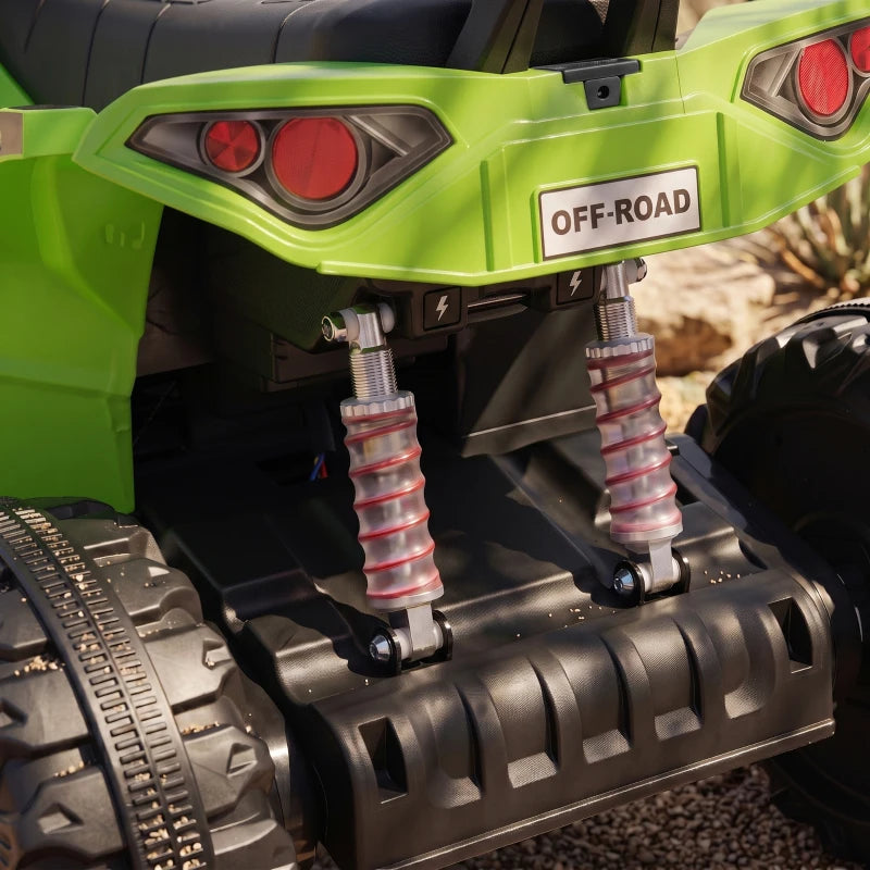 Green kids electric quad bike close-up of rear suspension springs and shock absorber