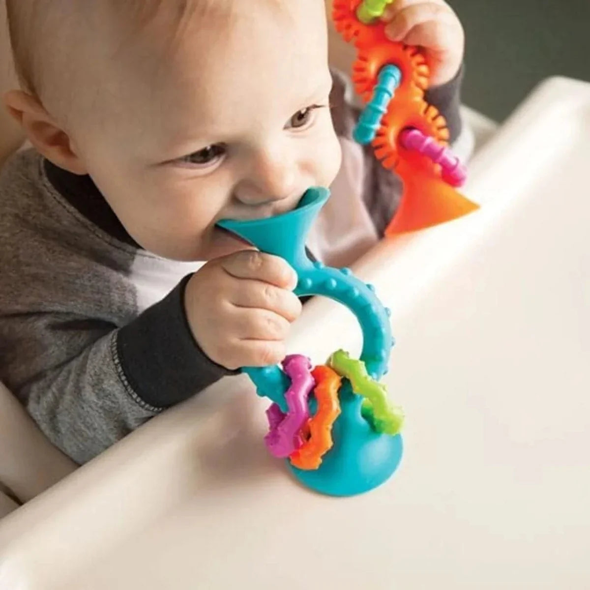 Teal loop teether with colorful squiggle links for teething